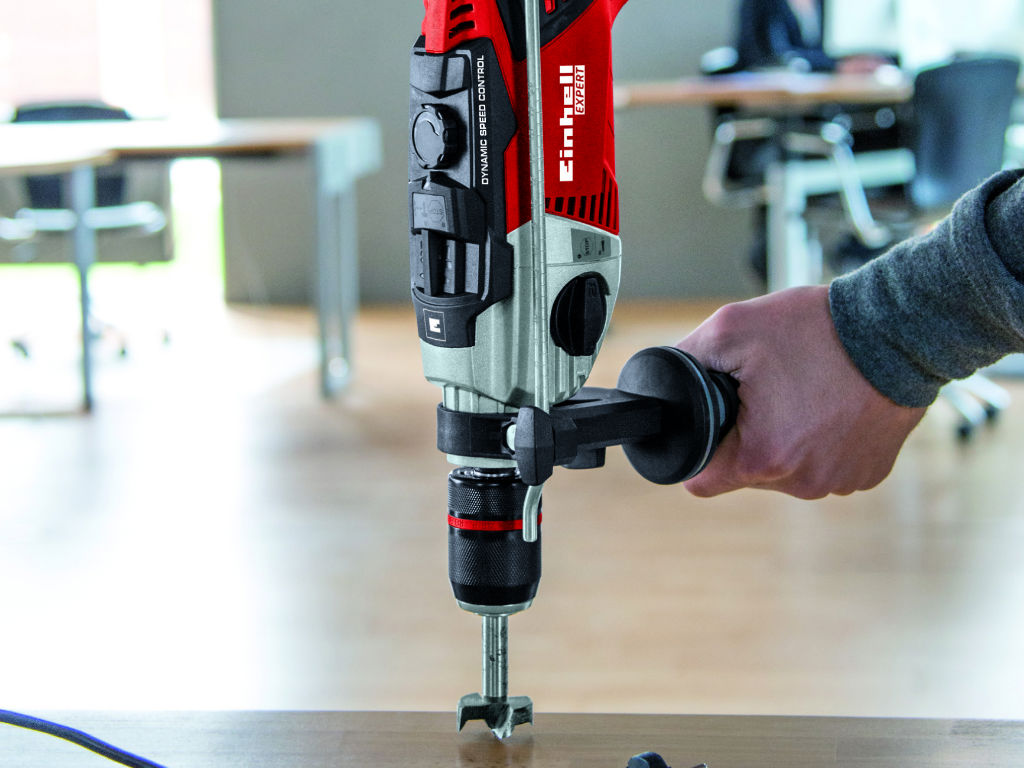 A man using the impact drill.