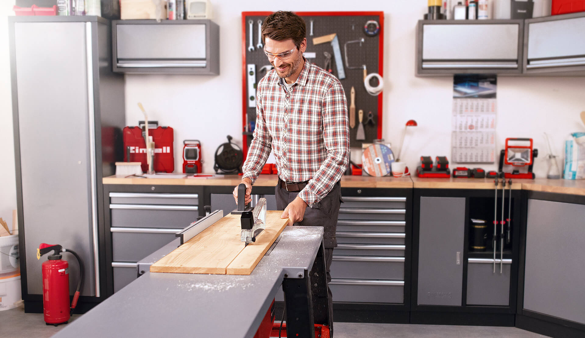 man working with table saw with parallel stop